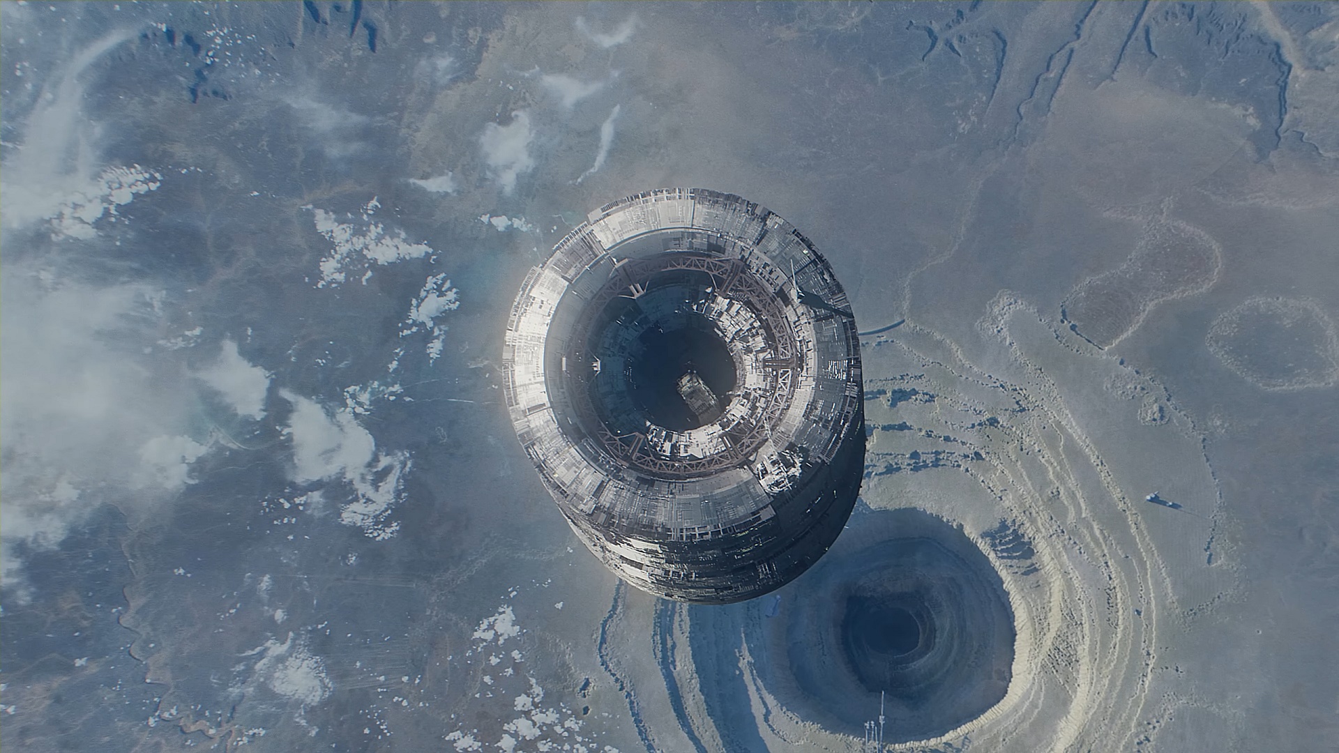Halo Infinite: Step Inside trailer image of Perihelion Station viewed from the top-down over KC-59